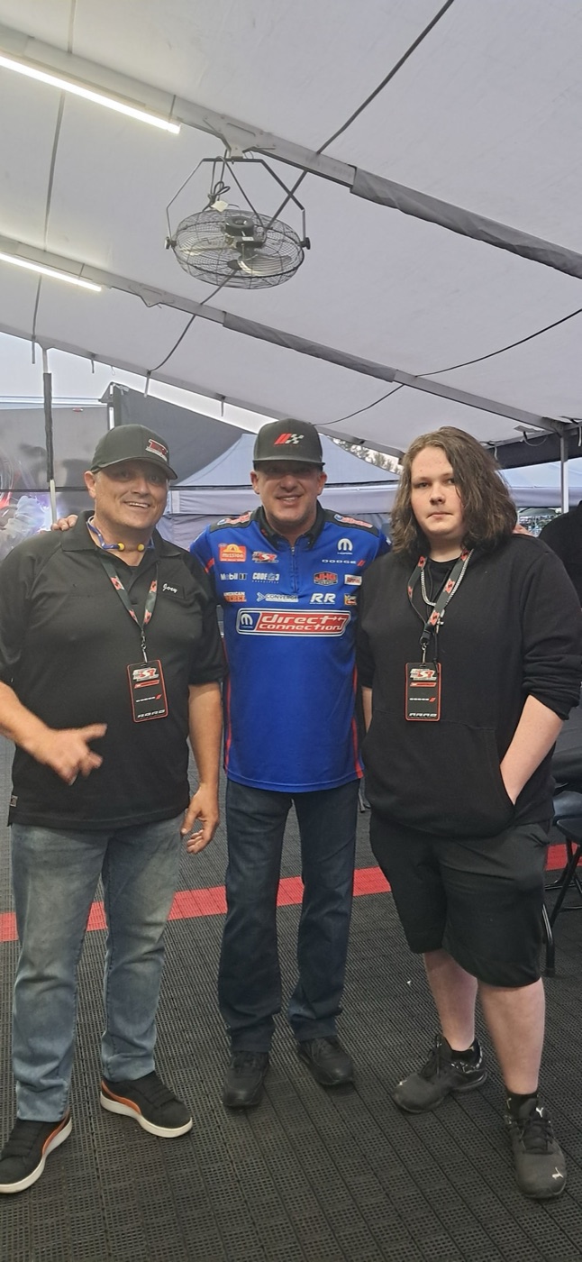 JOEY with family and Tony Stewart under the Direct Connection team tent at Pacific Raceways