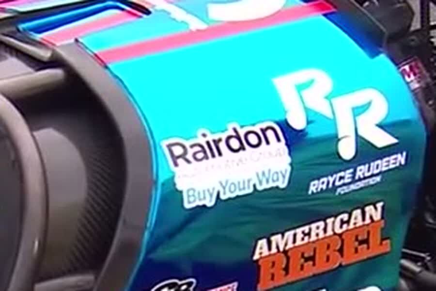 Close crop of the Rairdon Buy Your Way decal on the cowl of Tony Stewart's Top Fuel dragster