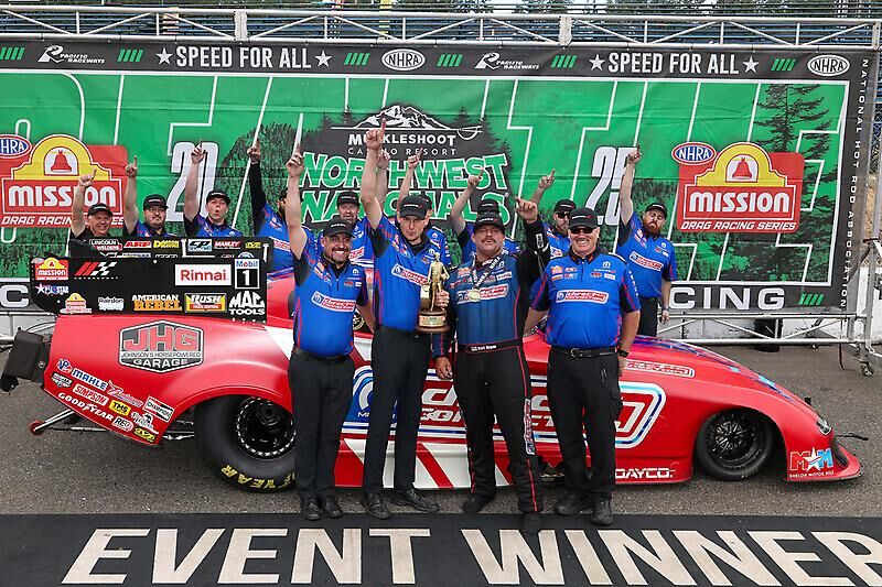Matt Hagan and the Tony Stewart Racing crew in the Northwest Nationals winner's circle